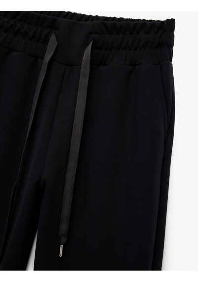Koton Yüksek Bel Modal Karışımlı Bağcıklı Cepli Jogger Eşofman Altı Siyah 6wak40120nk Siyah Koton Yüksek Bel Modal Karışımlı Bağcıklı Cepli Jogger Eşofman Altı Siyah 6wak40120nk Siyah