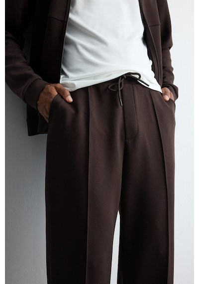 Defacto Ultra Yumuşak Baggy Fit Elastik Bel Ön Dikiş Detaylı Dalgıç Kumaş Jogger Pantolon H6171ax26aubn338 Kahve-bn338