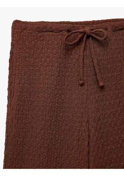 Koton Bürümcük Kumaş Dokulu Beli Bağcıklı Düz Bol Paça Pantolon Kahverengi 6sak40023ek Kahve Koton Bürümcük Kumaş Dokulu Beli Bağcıklı Düz Bol Paça Pantolon Kahverengi 6sak40023ek Kahve