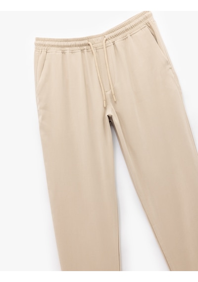 Koton Viskon Cep Detaylı Rayon Tapered Beli Bağcıklı Eşofman Pantolon Bej 5sam40010hw Ekru