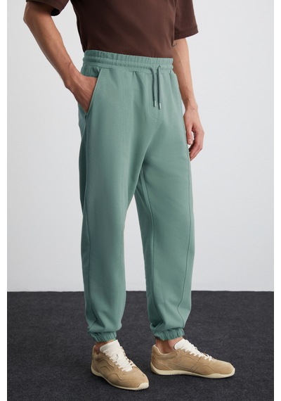 Grimelange ROWAN Erkek Organik Pamuklu Relaxed Fit İçi Polarlı Süs etiketli Jogger Yeşil Eşofman Altı