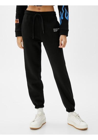 Koton Jogger Eşofman Altı Beli Bağcıklı Cep Detaylı Nakışlı Siyah 4wal40038ık 4WAL40038IK999 Siyah Koton Jogger Eşofman Altı Beli Bağcıklı Cep Detaylı Nakışlı Siyah 4wal40038ık 4WAL40038IK999 Siyah