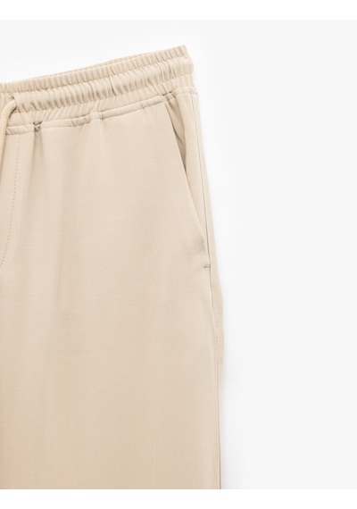 Koton Viskon Cep Detaylı Rayon Tapered Beli Bağcıklı Eşofman Pantolon Bej 5sam40010hw Ekru