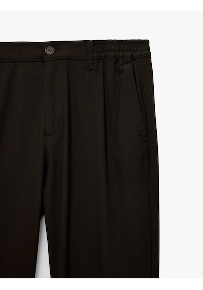 Koton Viskon Karışımlı Cepli Beli Lastikli Düğmeli Slim Fit Pileli Kumaş Pantolon Kahverengi 7wam40082nw Kahve Koton Viskon Karışımlı Cepli Beli Lastikli Düğmeli Slim Fit Pileli Kumaş Pantolon Kahverengi 7wam40082nw Kahve