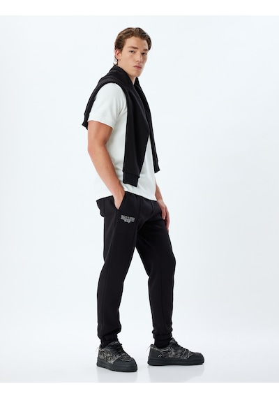 Koton Spor Eşofman Altı Jogger Slogan Baskılı Cep Detaylı Pamuk Karışımlı Siyah 5wam40041nk Siyah Koton Spor Eşofman Altı Jogger Slogan Baskılı Cep Detaylı Pamuk Karışımlı Siyah 5wam40041nk Siyah