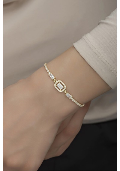 Nereze 925 Ayar Gümüş Gold Suyolu Baget Taşlı Tektaş Bileklik Nereze 925 Ayar Gümüş Gold Suyolu Baget Taşlı Tektaş Bileklik