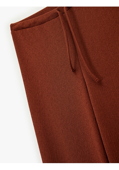 Koton Beli Lastikli Bağlamalı Dokulu Uzun Geniş Paça Pantolon Kiremit 6wak40122ek Çok Renkli Koton Beli Lastikli Bağlamalı Dokulu Uzun Geniş Paça Pantolon Kiremit 6wak40122ek Çok Renkli