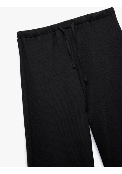 Koton Beli Bağcıklı Geniş Paça Bürümcük Pantolon Siyah 6wal40014ık Siyah Koton Beli Bağcıklı Geniş Paça Bürümcük Pantolon Siyah 6wal40014ık Siyah