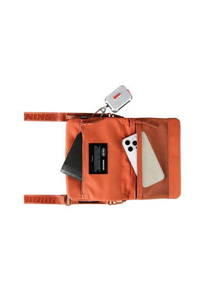 Skinarma Satchel Juno Desenli Naylon Scout Bilek Askı Kayışlı Aksesuar Çantası Turuncu