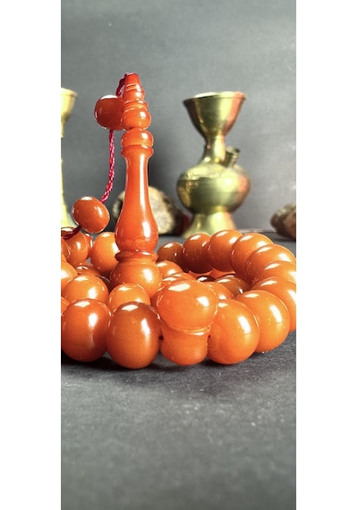 Osmanlı Sıkma Kehribar Numan Çamurdaş 8x9.5mm. 30.5gr.