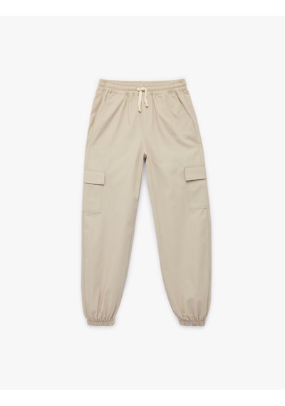 Koton Pamuklu Cep Detaylı Rahat Kesim Kargo Jogger Pantolon Taş 6skb40085tw Taş