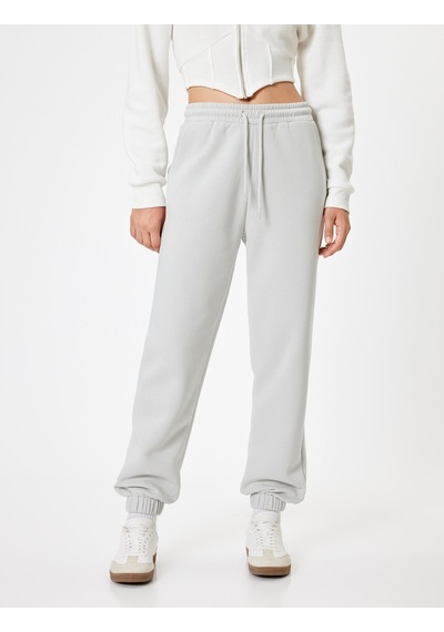 Koton Şardonlu Jogger Eşofman Altı Beli Bağcıklı Cepli Standart Bel Rahat Kalıp Gri 5wal40018ık Gri Koton Şardonlu Jogger Eşofman Altı Beli Bağcıklı Cepli Standart Bel Rahat Kalıp Gri 5wal40018ık Gri