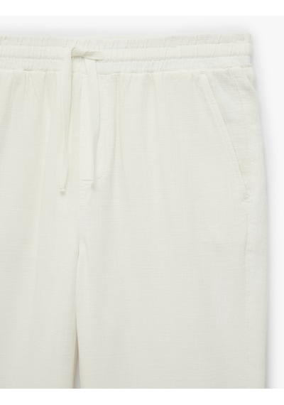 Koton Regular Fit Pamuklu Cepli Beli Bağcıklı Lastikli Pantolon Beyaz 7wam40050hw