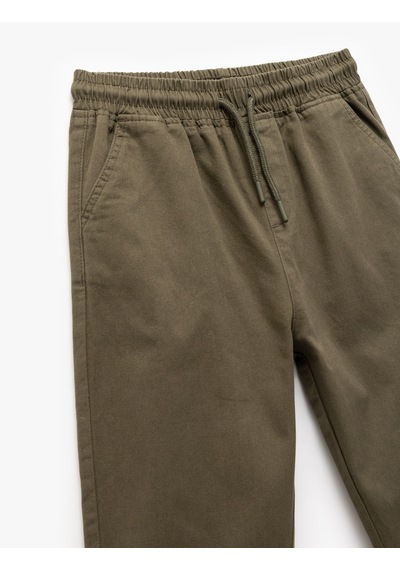Koton Beli Bağcıklı Cep Detaylı Pamuklu Gabardin Jogger Pantolon Haki 7wkb40001tw