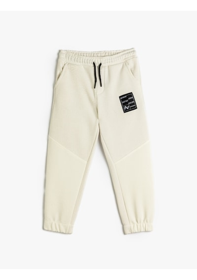 Koton Jogger Eşofman Altı Beli Bağlamalı Şardonlu Renk Bloklu Beyaz 5wkb40114tk Beyaz Koton Jogger Eşofman Altı Beli Bağlamalı Şardonlu Renk Bloklu Beyaz 5wkb40114tk Beyaz