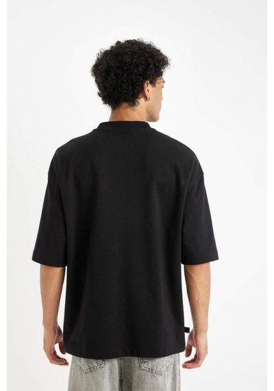 DeFacto Siyah Loose Fit Bisiklet Yaka Çiçek Baskılı Ağır Kumaş Kısa Kollu Tişört C7056AX24AUBK81