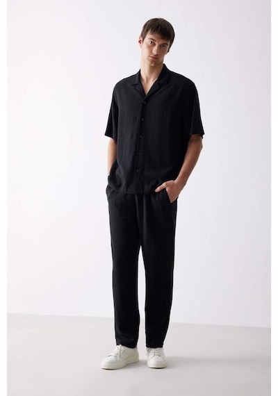 Defacto Yazlık Viskon Jogger Pantolon Regular Fit Normal Kesim Keten Karışımlı Düz Paça Cepli B4867ax25smbk81 Siyah