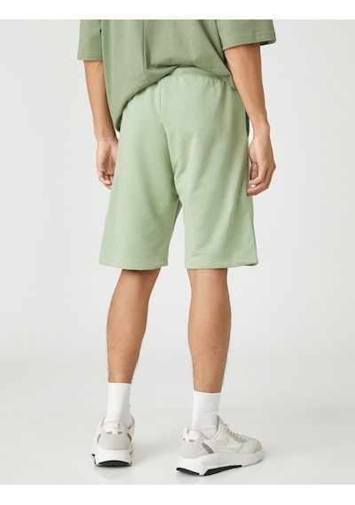 Koton Basic Şort Beli Bağcıklı Slogan Etiket Baskılı Cepli Yeşil 3sam40008mk 3SAM40008MK786 Yeşil Koton Basic Şort Beli Bağcıklı Slogan Etiket Baskılı Cepli Yeşil 3sam40008mk 3SAM40008MK786 Yeşil