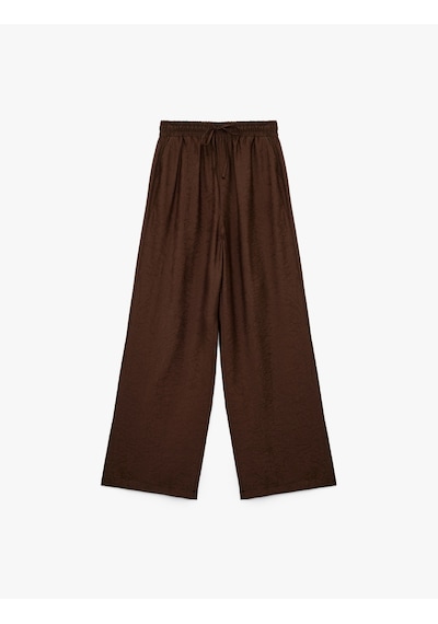 Koton Modal Kumaş Cepli Beli Lastikli Bağlamalı Floral Dokulu Geniş Paça Pantolon Kahverengi 6wak40102pw Kahve