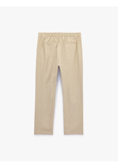 Koton Slim Fit Cepli Pileli Keten Karışımlı Düğmeli Beli Lastikli Bağcıklı Pantolon Bej 6sam40167hw Ekru Koton Slim Fit Cepli Pileli Keten Karışımlı Düğmeli Beli Lastikli Bağcıklı Pantolon Bej 6sam40167hw Ekru