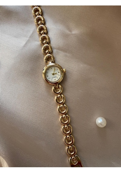 Retro Minimal Boncuk Kordon Vintage Kadın Kol Saati Yuvarlak Altın