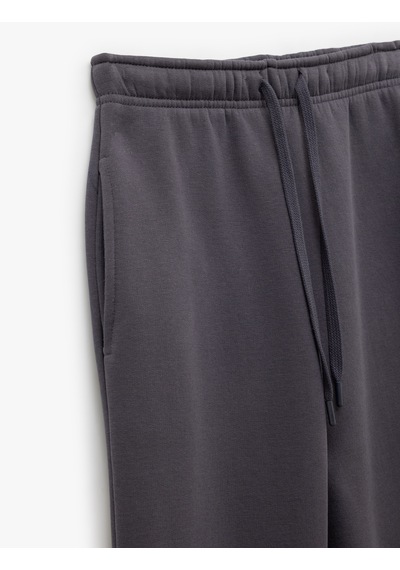Koton Pamuklu Şardonlu Cepli Beli Bağcıklı Oversize Jogger Eşofman Altı Gri 6wal40037ık Gri