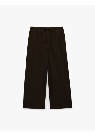 Koton Bol Kalıp Viskon Karışımlı Beli Bağcıklı Geniş Paça Pantolon Kahverengi 6sam40120hw Kahve Koton Bol Kalıp Viskon Karışımlı Beli Bağcıklı Geniş Paça Pantolon Kahverengi 6sam40120hw Kahve