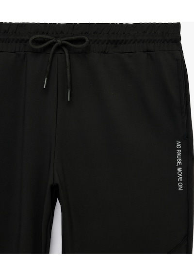 Koton Baskılı Lastikli Paça Cepli Beli Bağcıklı Jogger Spor Eşofman Altı Siyah 6sam40081nk Koton Baskılı Lastikli Paça Cepli Beli Bağcıklı Jogger Spor Eşofman Altı Siyah 6sam40081nk