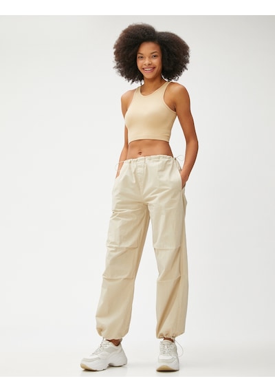 Koton Crop Atlet Fitilli Halter Yaka Kolsuz Bej 3sal30056ık 3SAL30056IK050 Ekru Koton Crop Atlet Fitilli Halter Yaka Kolsuz Bej 3sal30056ık 3SAL30056IK050 Ekru