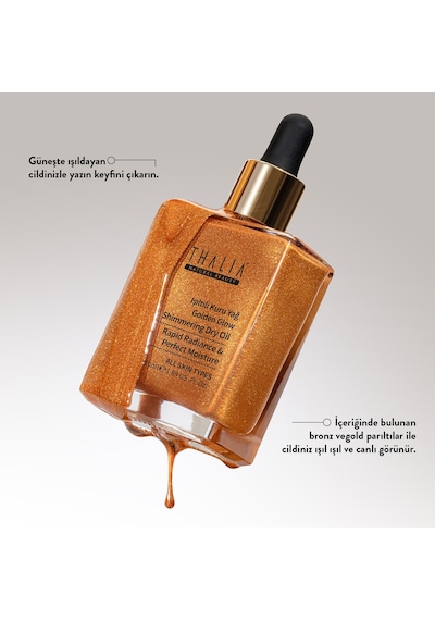 Thalia Altın Işıltılı Besleyici Nemlendiricili Kuru Yağ 50 Ml Thalia Altın Işıltılı Besleyici Nemlendiricili Kuru Yağ 50 Ml