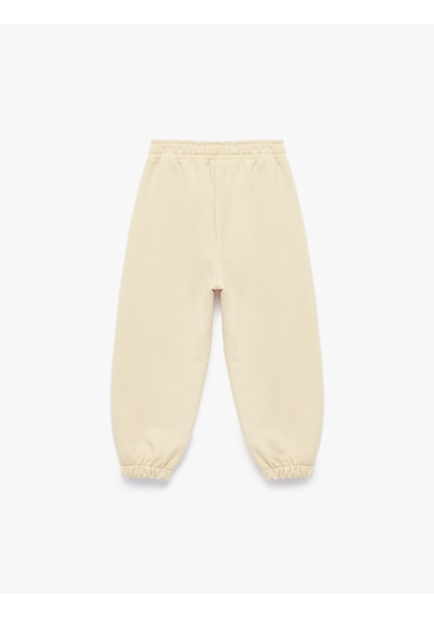 Koton Pamuklu Lastikli Paça Beli Bağcıklı Oversize Basic Eşofman Altı Bej 6smb40056tk Ekru