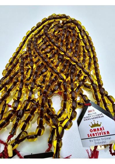 Omari İmzalı Sertifikalı Alman Faturan Sıkma Kehribar Tesbih 9x11 Mm Fıçı Kesim