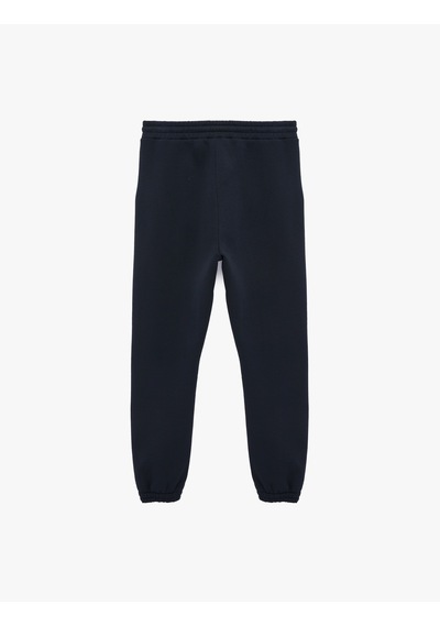 Koton Lastikli Paça Cepli Şardonlu Beli Bağcıklı Jogger Spor Eşofman Altı Lacivert 6sam40069nk Koton Lastikli Paça Cepli Şardonlu Beli Bağcıklı Jogger Spor Eşofman Altı Lacivert 6sam40069nk
