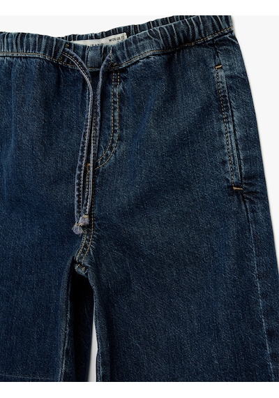 Koton Pamuklu Beli Bağcıklı Geniş Paça Denim Pantolon Koyu İndigo 6skg40033ad Koyu Indigo