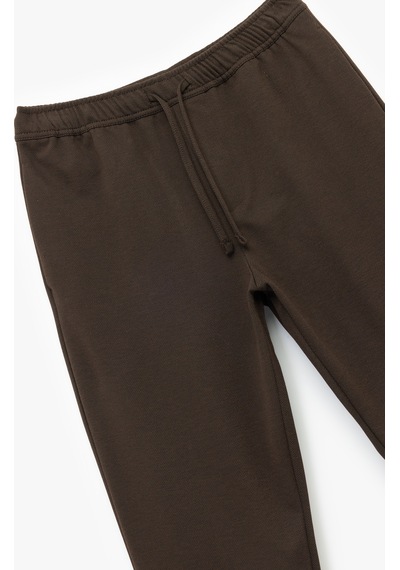 Koton Straight Fit Pike Kumaş Cep Detaylı Rahat Kesim Beli Bağcıklı Pantolon Kahverengi 7wam40003hk Kahve Koton Straight Fit Pike Kumaş Cep Detaylı Rahat Kesim Beli Bağcıklı Pantolon Kahverengi 7wam40003hk Kahve