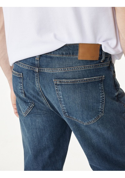 Koton Pamuklu Düz Paça Normal Bel Straight Fit Jean Pantolon - Mark Jean Koyu İndigo 6sam40161nd Koton Pamuklu Düz Paça Normal Bel Straight Fit Jean Pantolon - Mark Jean Koyu İndigo 6sam40161nd