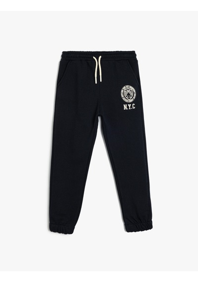 Koton Jogger Eşofman Altı Baskı Detaylı Beli Bağlamalı Cepli Şardonlu Lacivert 5wkb40088tk Lacivert