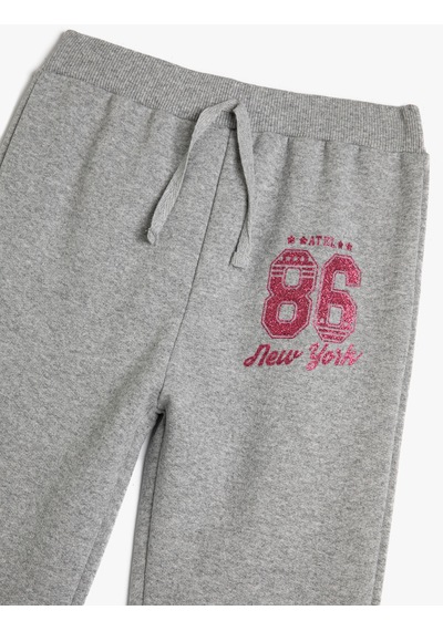 Koton Jogger Eşofman Altı Beli Bağlamalı Sim Baskı Detaylı Gri 4skg40031ak Gri Koton Jogger Eşofman Altı Beli Bağlamalı Sim Baskı Detaylı Gri 4skg40031ak Gri