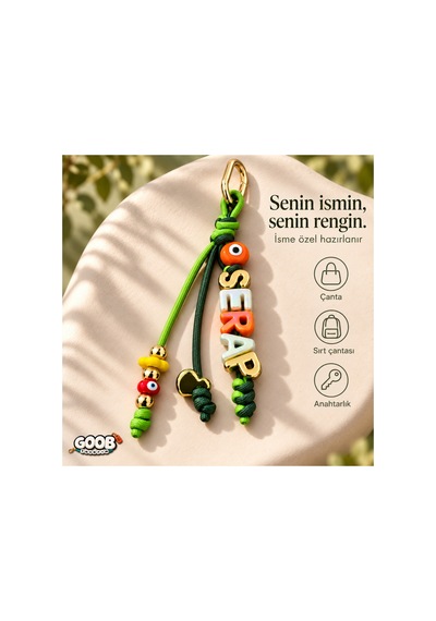 Goob Kişiye Özel İsimli Çanta Aksesuarı Yeşil Kordonlu, Renkli Boncuklu Çanta Charm Çok Renkli Çok Renkli Goob Kişiye Özel İsimli Çanta Aksesuarı Yeşil Kordonlu, Renkli Boncuklu Çanta Charm Çok Renkli Çok Renkli