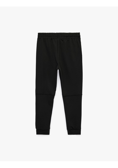 Koton Baskılı Lastikli Paça Cepli Beli Bağcıklı Jogger Spor Eşofman Altı Siyah 6sam40081nk Koton Baskılı Lastikli Paça Cepli Beli Bağcıklı Jogger Spor Eşofman Altı Siyah 6sam40081nk