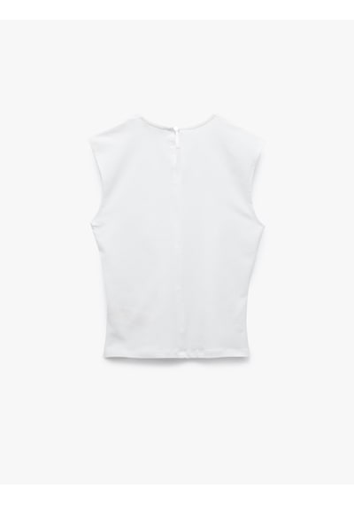 Koton Pamuklu Slim Fit Arkadan Kapama Detaylı Sıfır Kol Tişört Kırık Beyaz 5sak10059pk Ekru Koton Pamuklu Slim Fit Arkadan Kapama Detaylı Sıfır Kol Tişört Kırık Beyaz 5sak10059pk Ekru