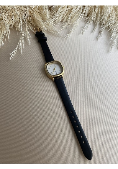 Retro Minimal Vintage Deri Kordon Kadın Kol Saati Kelebek Model Gümüş