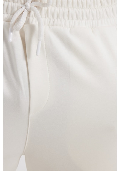 Tudors Erkek Ekru Baggy Fit Rahat Kesim Modal Kumaş Soft Doku Beli Bağcıklı Yan Cepli Eşofman Altı-46292 Tudors Erkek Ekru Baggy Fit Rahat Kesim Modal Kumaş Soft Doku Beli Bağcıklı Yan Cepli Eşofman Altı-46292