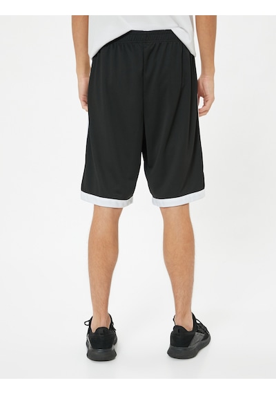 Koton Spor Şort Oversize Slogan Baskılı Beli Lastikli Çizgi Detaylı Siyah 4sam40036nk Siyah Koton Spor Şort Oversize Slogan Baskılı Beli Lastikli Çizgi Detaylı Siyah 4sam40036nk Siyah
