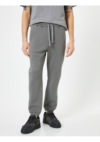 Koton Jogger Eşofman Altı Beli Bağcıklı Cep Detaylı Antrasit 4sam40058mk 4SAM40058MK928 Antrasit Koton Jogger Eşofman Altı Beli Bağcıklı Cep Detaylı Antrasit 4sam40058mk 4SAM40058MK928 Antrasit