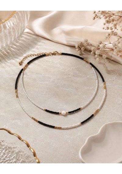 Noir Denge Siyah Beyaz Çift Sıra Boncuklu Kadın Kolye Altın Renk Ara Detaylı Katmanlı Choker Kolye Renkli Noir Denge Siyah Beyaz Çift Sıra Boncuklu Kadın Kolye Altın Renk Ara Detaylı Katmanlı Choker Kolye Renkli