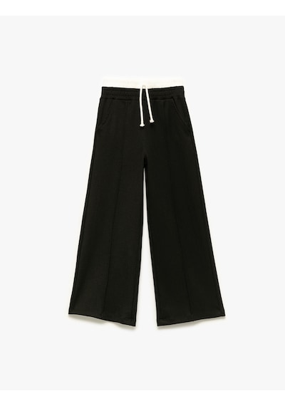 Koton Beli Bağcıklı Bürümcük Kumaş Basic Geniş Paça Pantolon Siyah 5skg40215ak Siyah