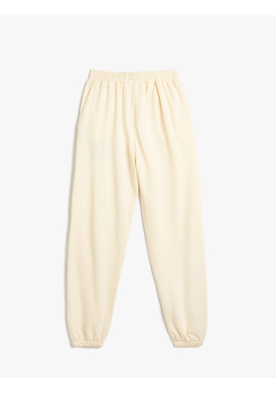 Koton Jogger Eşofman Altı Beli Bağlamalı Cepli Baskılı Şardonlu Pamuklu Bej 5wkg40039ak Ekru Koton Jogger Eşofman Altı Beli Bağlamalı Cepli Baskılı Şardonlu Pamuklu Bej 5wkg40039ak Ekru