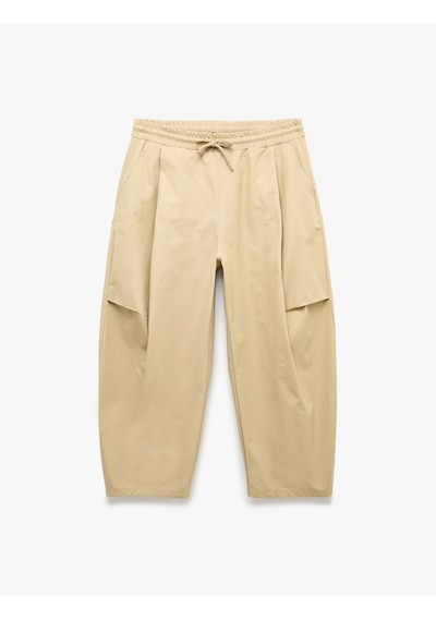Koton Rahat Kalıp Beli Bağcıklı Cep Detaylı Pamuklu Gabardin Barrel Pantolon Bej 7wam40077nw Ekru Koton Rahat Kalıp Beli Bağcıklı Cep Detaylı Pamuklu Gabardin Barrel Pantolon Bej 7wam40077nw Ekru
