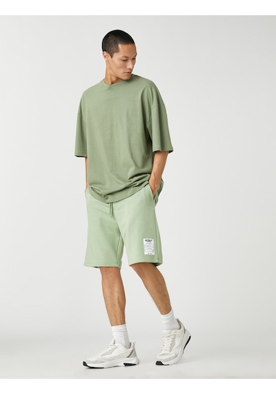 Koton Basic Şort Beli Bağcıklı Slogan Etiket Baskılı Cepli Yeşil 3sam40008mk 3SAM40008MK786 Yeşil Koton Basic Şort Beli Bağcıklı Slogan Etiket Baskılı Cepli Yeşil 3sam40008mk 3SAM40008MK786 Yeşil